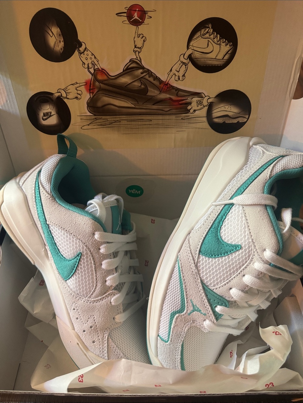 Nike Women's Jordan White Sneakers with Teal Accents